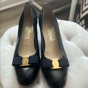 Salvatore Ferragamo Black and Gold Heels with Vara Bow